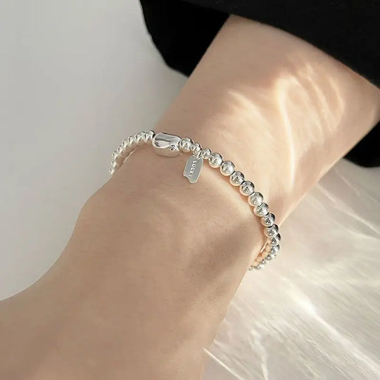 Geluksboon String Armband - Luxe Mode Statement voor vrouwen