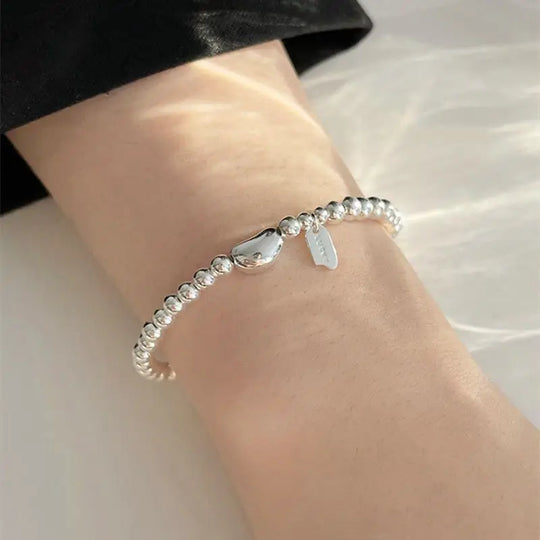 Geluksboon String Armband - Luxe Mode Statement voor vrouwen